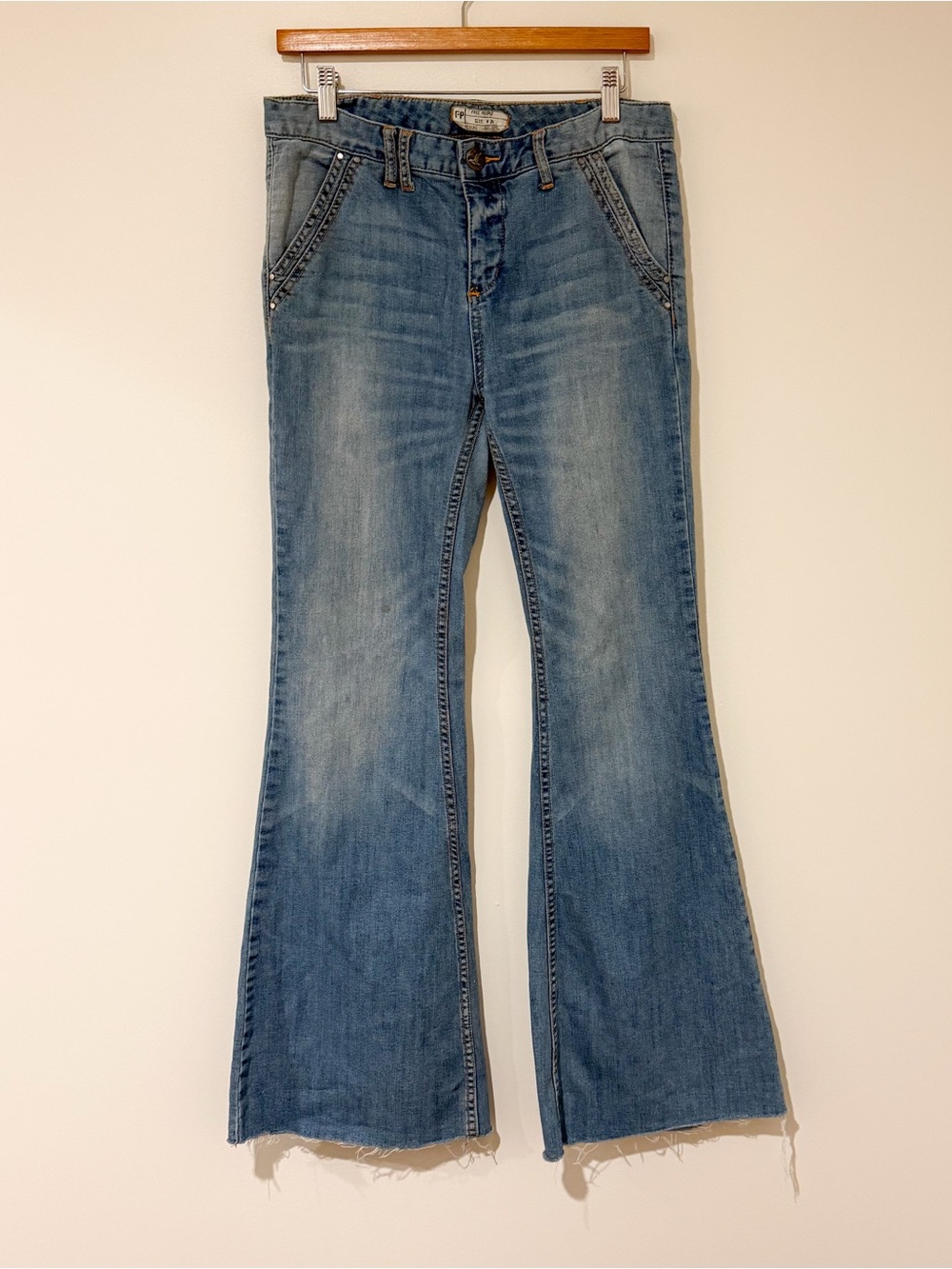 Free People Light Blue Flared Jeans with Raw Hem